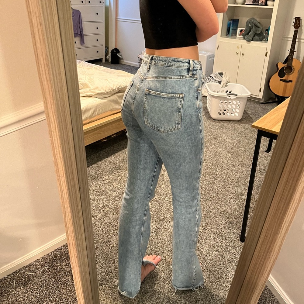 Zara straight legged blue jeans. SIZE 8. A few small rips.